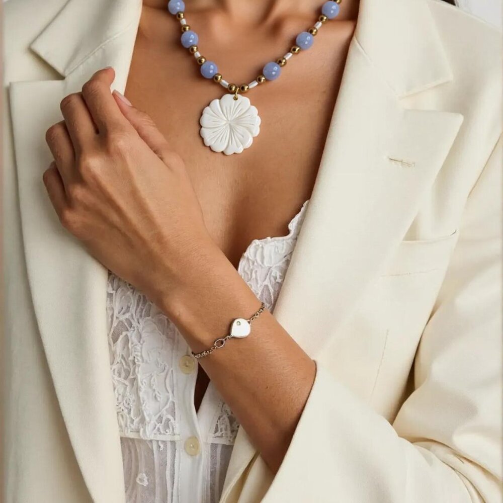 Moonstone Mood. Combo of ice blue, pearls and gold beaded medium length necklace